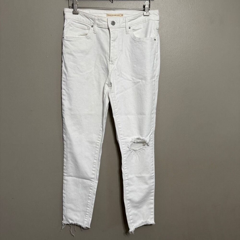 Levi’s high rise skinny ankle white with distressed bottom size 30